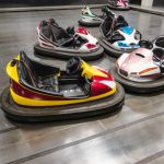 Colorful electric bumper car in autodrom in the fairground attractions at amusement park.